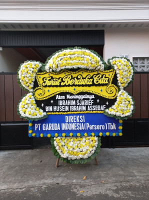 Papan Bunga Duka di Pasir Gunung Selatan